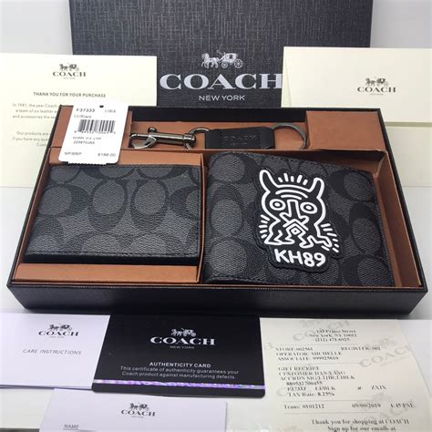 dompet coach men.